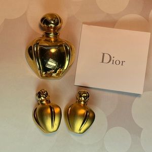 Authentic Christian Dior Brooch and earrings .
